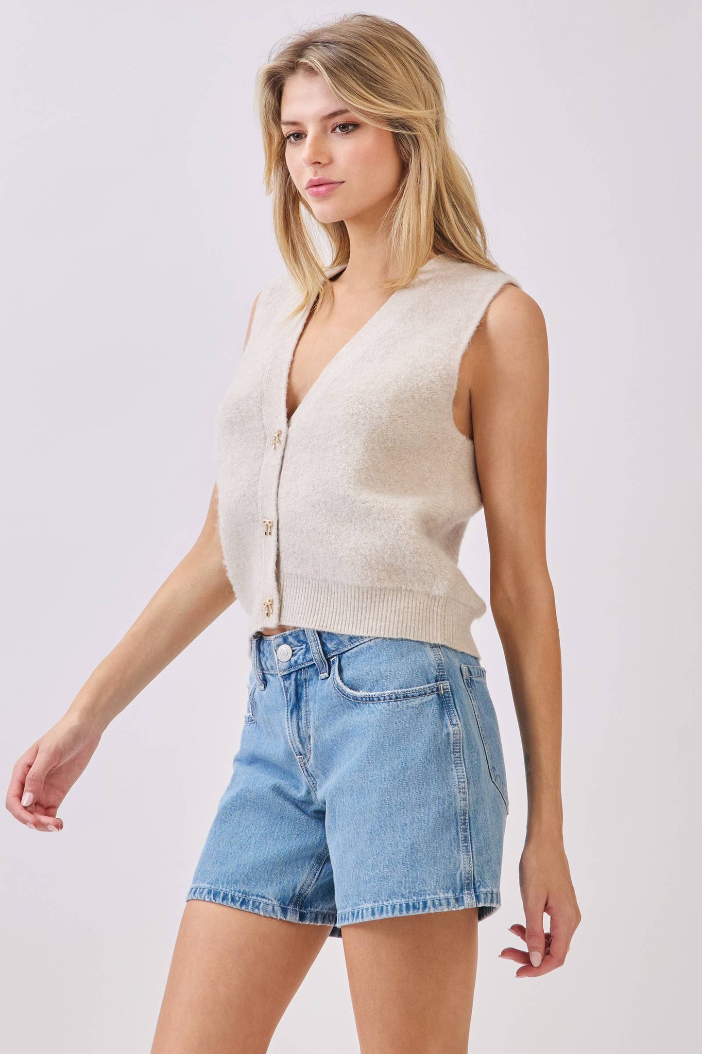 Ivory Fuzzy Sweater Vest with Gold Bow Buttons