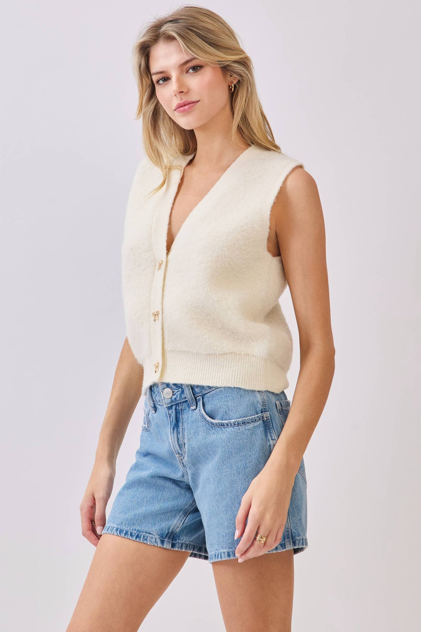 Ivory Fuzzy Sweater Vest with Gold Bow Buttons