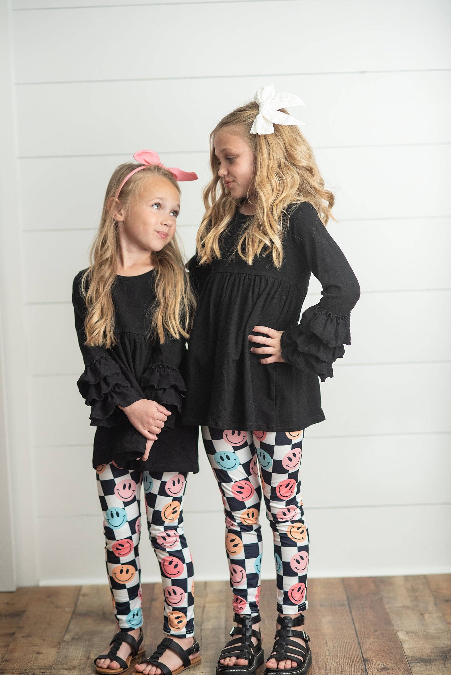 Black Ruffle Top with Black & White Check Smiley Face Leggings Set