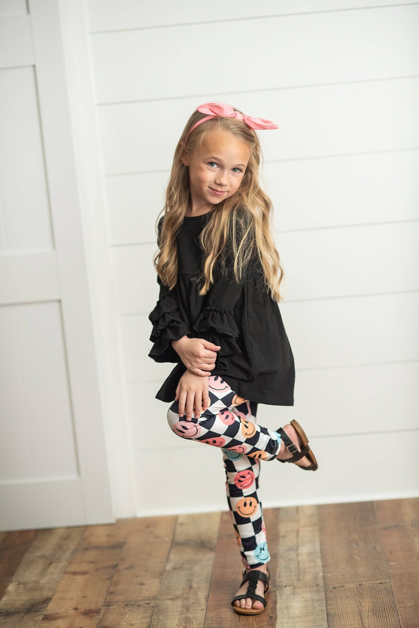 Black Ruffle Top with Black & White Check Smiley Face Leggings Set
